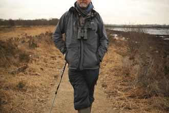 Dave stands on a nature reserve