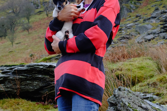 Emma with her dog in the hills