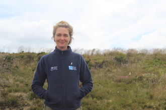 Toni from the RSPB stood on Dove Stone