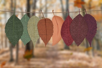 Leaves cut out of fabric in different autumnal colours