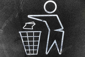 Outline symbol of person throwing waste in bin