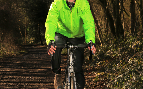 Richard cycling in a wood