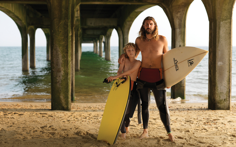 Father and son with surf boards