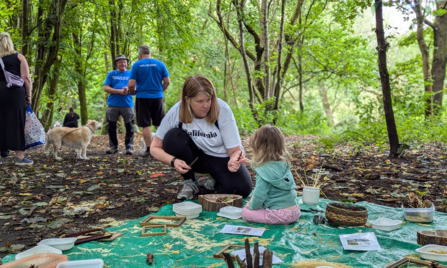 Enjoying some sensory play in the forest area