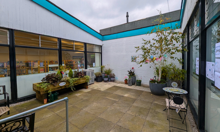 The inner courtyard was cleaned up and planted with colourful shrubs, flowers and grasses