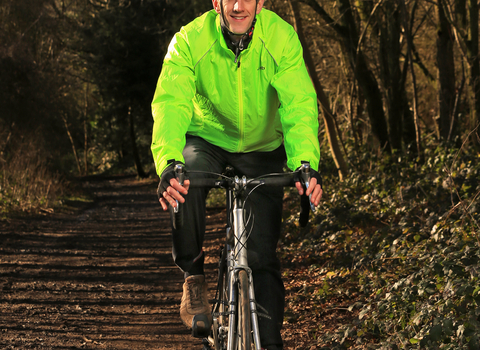 Richard cycling in a wood