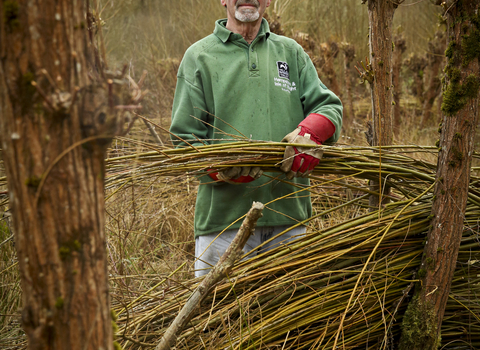 Malcolm volunteering on a reserve