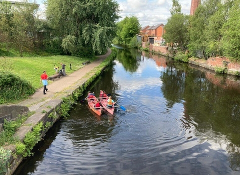 Volunteers taking part in a river clean up